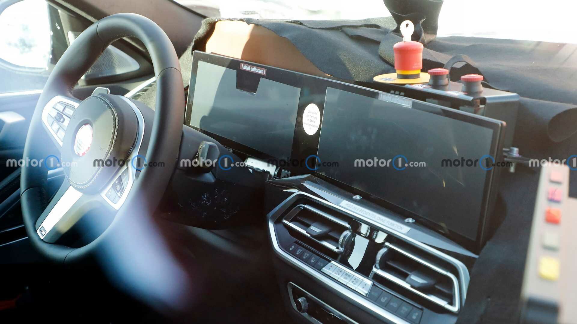 Шпионы сфотографировали интерьер обновлённого BMW X6 с экраном как в Мерседесах