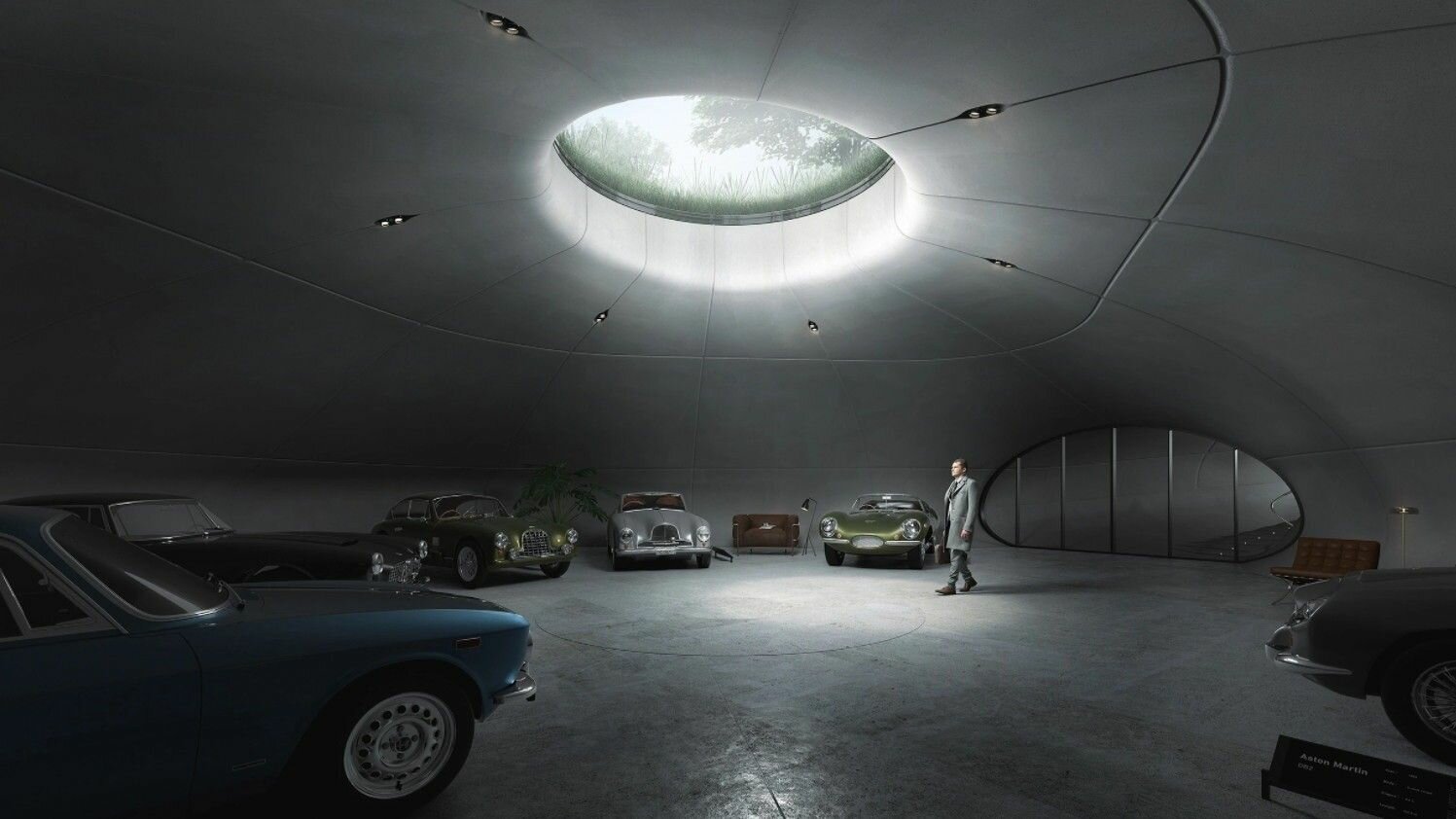 Посмотрите на шпионский гараж для винтажных Aston Martin в... пещере