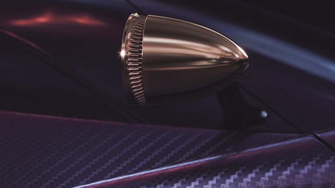 Появились тизеры карбонового суперкара De Tomaso с V12