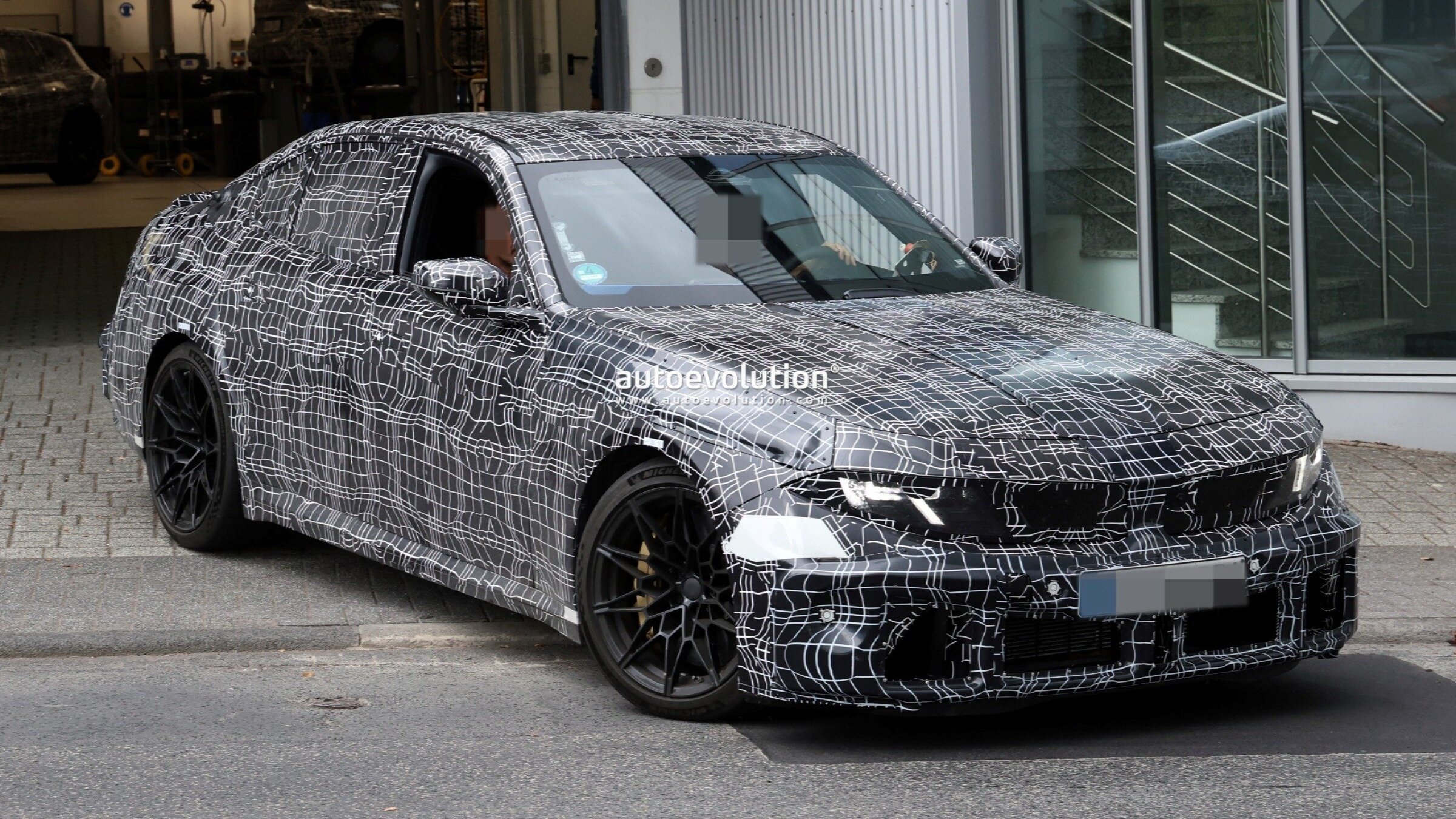 Особенности дизайна нового BMW M3 показали на шпионских фото