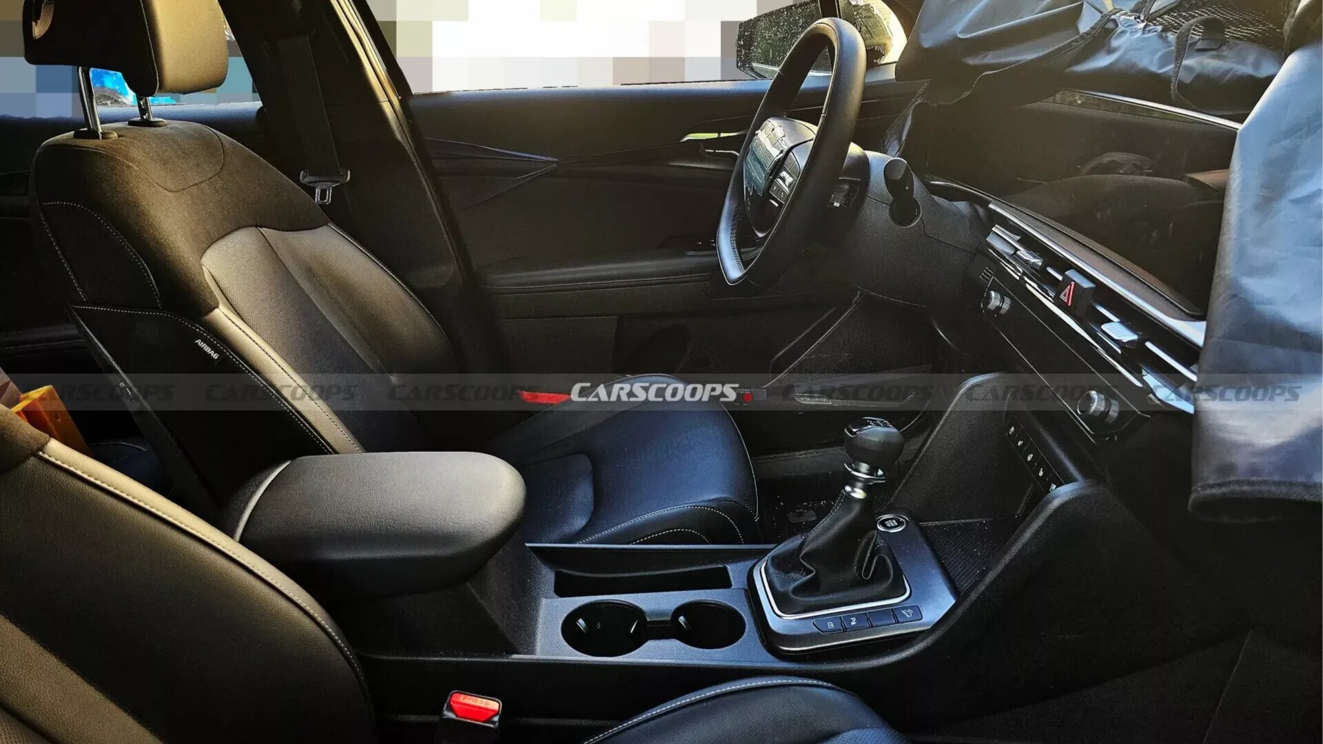 Шпионы засняли большой экран в салоне обновлённого Kia Sportage