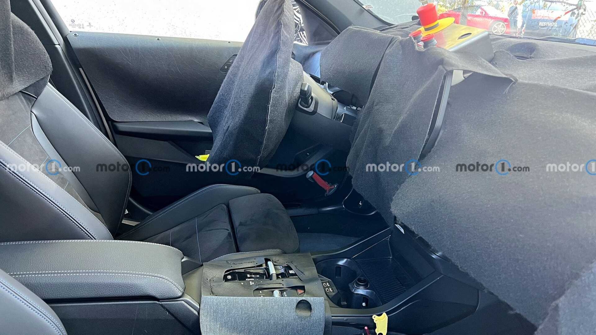 Шпионы сфотографировали салон обновлённого BMW 1 серии