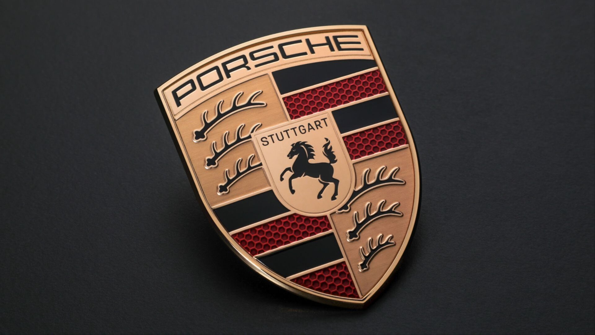 Компания Porsche представила обновлённый логотип