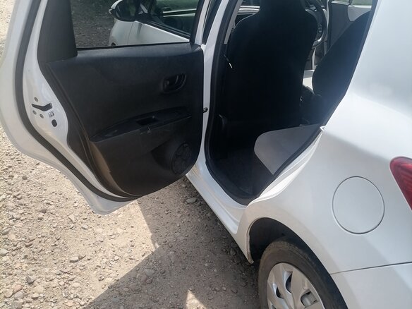 2012 Toyota Vitz III (XP130), белый, 580000 рублей - вид 15