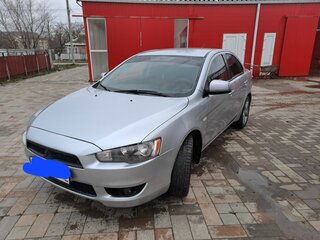 2010 Mitsubishi Lancer X, серебристый, 750000 рублей, вид 2