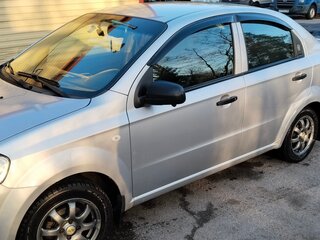 2011 Chevrolet Aveo I Рестайлинг, серебристый, 650000 рублей, вид 4