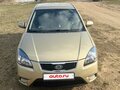 2010 Kia Rio II Рестайлинг, бежевый, 430000 рублей - вид 2
