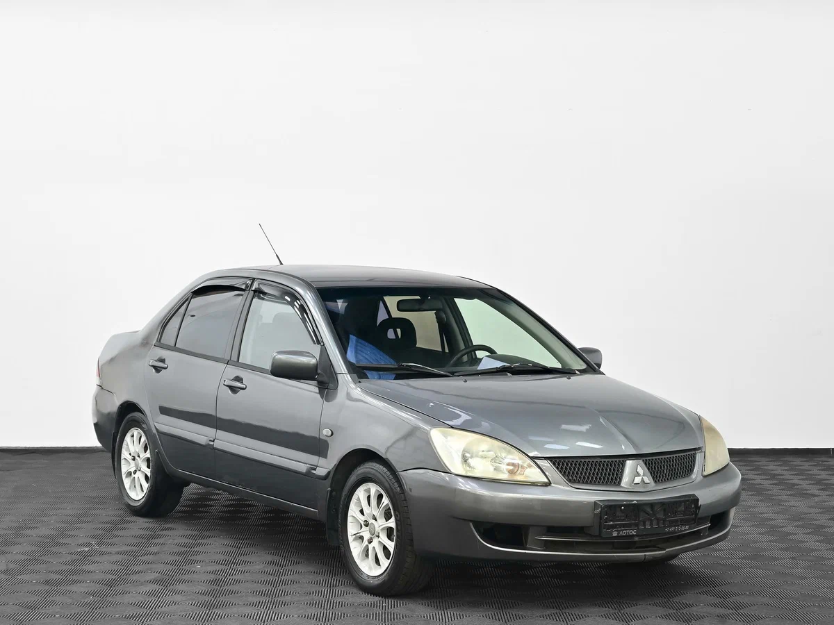 Открыть фотографии: Mitsubishi Lancer IX Рестайлинг