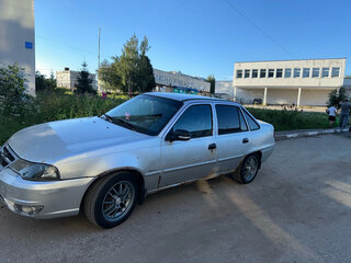 2012 Daewoo Nexia I Рестайлинг, серебристый, 230000 рублей, вид 1