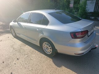 2016 Volkswagen Jetta VI Рестайлинг, серебристый, 1180000 рублей, вид 4