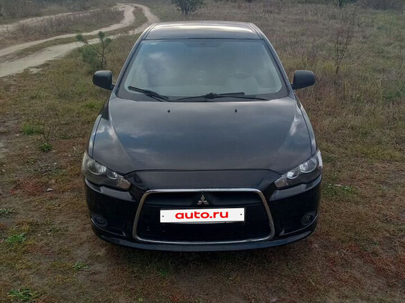 2008 Mitsubishi Lancer X, чёрный, 650000 рублей - вид 8