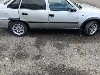 2011 Daewoo Nexia I Рестайлинг, серебристый, 145000 рублей, вид 5