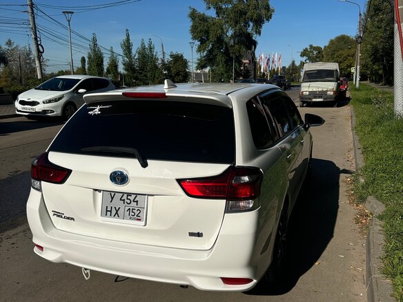 2018 Toyota Corolla Fielder XI (E160, E170) Рестайлинг 2, белый, 1350000 рублей - вид 1