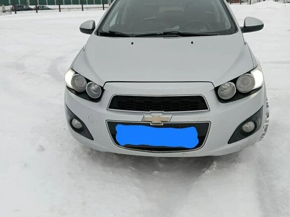 2012 Chevrolet Aveo II, серебристый, 650000 рублей
