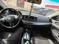 2013 Mitsubishi Lancer X Рестайлинг, чёрный, 900000 рублей - вид 2