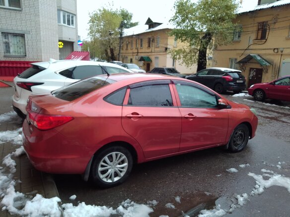2014 Haima M3, оранжевый, 900000 рублей - вид 2
