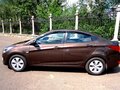 2016 Hyundai Solaris I Рестайлинг, коричневый, 945000 рублей - вид 2