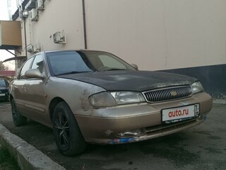 1997 Kia Clarus I, бежевый, 140000 рублей, вид 1