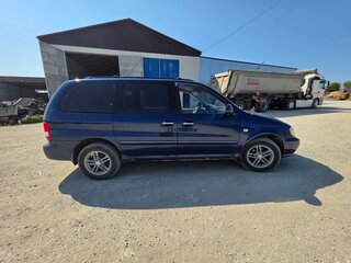 2004 Kia Carnival I Рестайлинг, синий, 430000 рублей, вид 4