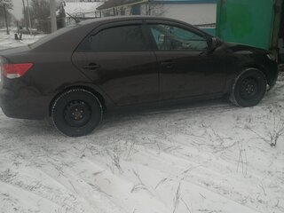 2010 Kia Cerato 5-speed II, коричневый, 850000 рублей, вид 1
