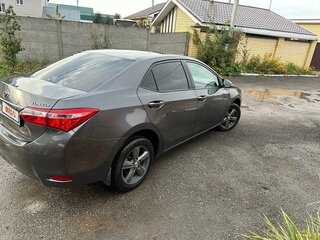 2013 Toyota Corolla XI (E160, E170, E180), серый, 1500000 рублей, вид 2