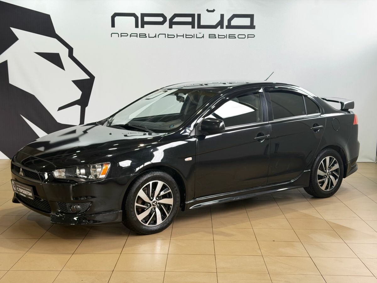 Открыть фотографии: Mitsubishi Lancer X