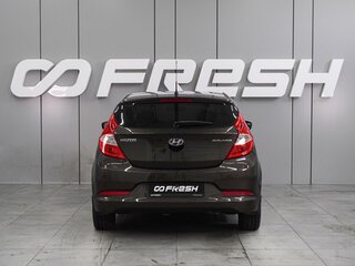 2015 Hyundai Solaris I Рестайлинг, коричневый, 994000 рублей, вид 4