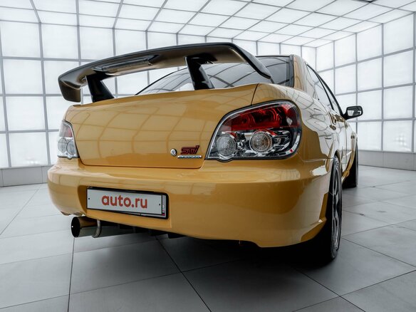 2004 Subaru Impreza WRX STi II Рестайлинг 1, жёлтый - вид 2