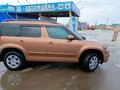 2014 Skoda Yeti I Рестайлинг, коричневый, 1106000 рублей - вид 7