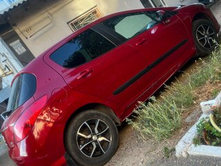 2012 Peugeot 308 I Рестайлинг, красный, 580000 рублей, вид 4