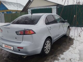 2011 Mitsubishi Lancer X Рестайлинг, серебристый, 770000 рублей, вид 4