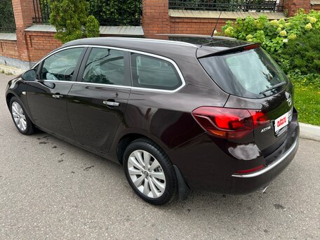 2014 Opel Astra J Рестайлинг, коричневый, 735000 рублей, вид 5