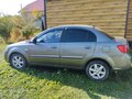 2009 Kia Rio II Рестайлинг, серый, 675000 рублей - вид 1