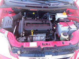 2010 Chevrolet Aveo I Рестайлинг, красный, 450000 рублей, вид 3
