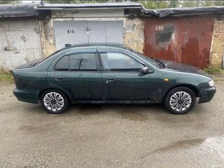 1997 Nissan Almera I (N15), зелёный, 138000 рублей, вид 2