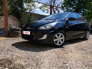 2011 Hyundai Solaris I, чёрный, 675000 рублей, вид 1
