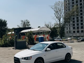 2014 Mitsubishi Lancer X Рестайлинг, белый, 799000 рублей, вид 1