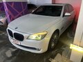 2009 BMW 7 серии 740i V (F01/F02/F04), белый, 1850000 рублей