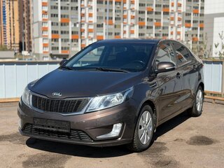 2014 Kia Rio 5-speed III, коричневый, 776000 рублей, вид 1