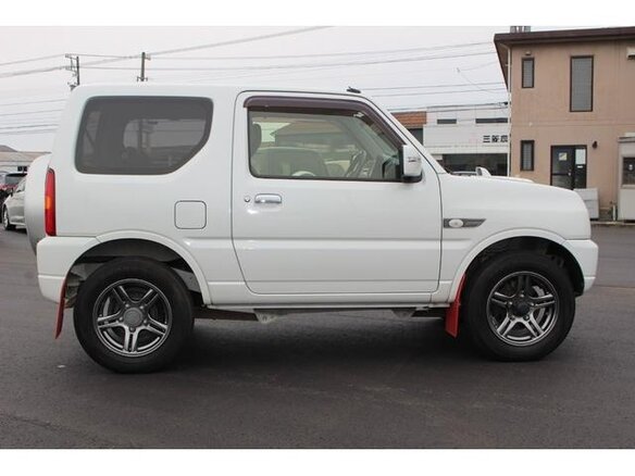 2015 Suzuki Jimny Kei car III Рестайлинг 2, белый - вид 10