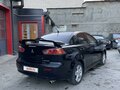2008 Mitsubishi Lancer X, чёрный, 690000 рублей - вид 4