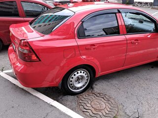 2010 Chevrolet Aveo I Рестайлинг, красный, 560000 рублей, вид 1