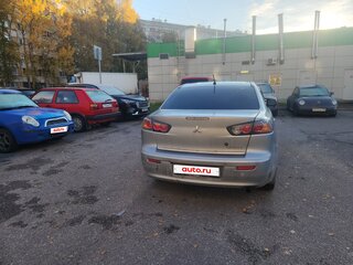 2013 Mitsubishi Lancer X Рестайлинг, серебристый, 550000 рублей, вид 3