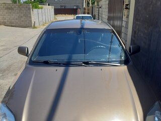 2004 Toyota Avensis II, коричневый, 660000 рублей, вид 3