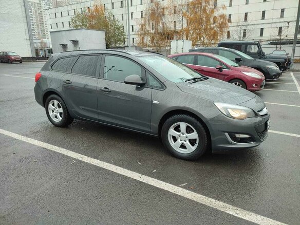 2014 Opel Astra J Рестайлинг, серый, 899000 рублей
