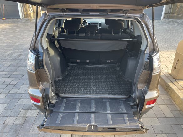 2012 Mitsubishi Outlander II Рестайлинг, коричневый, 1390000 рублей - вид 7