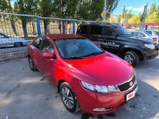 2012 Kia Cerato 6-speed II, красный, 1050000 рублей, вид 4