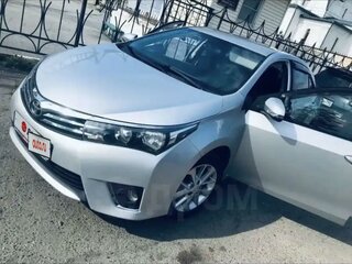 2014 Toyota Corolla XI (E160, E170, E180), серебристый, 1200000 рублей, вид 3