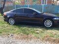 2013 Jaguar XF I Рестайлинг, коричневый, 1720000 рублей - вид 2