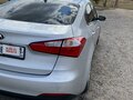 2015 Kia Forte II, серый, 1350000 рублей - вид 4